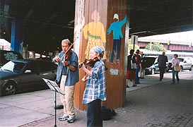 [photo, Street musicians near Baltimore Farmers' Market, Guilford Ave., Baltimore, Maryland]
